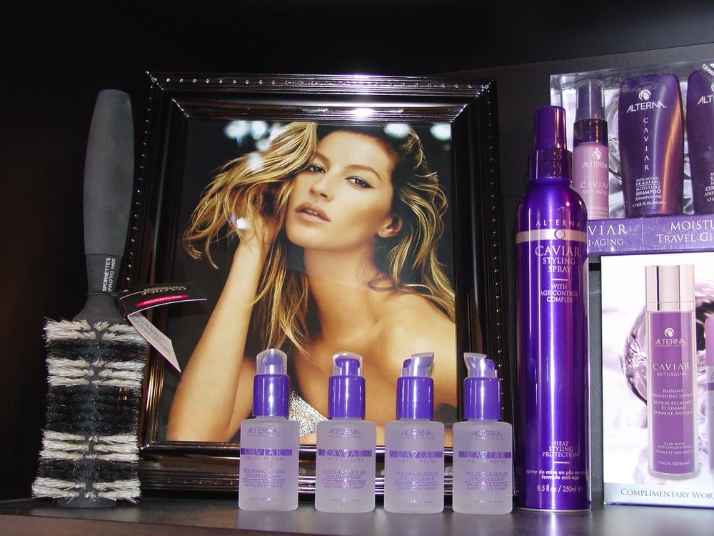 Vogue Hair and Nail Studios Logo