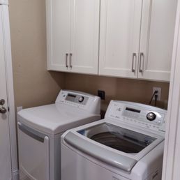 Laundry room put back together with new cabinets