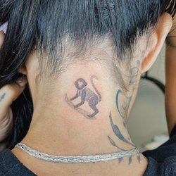 White Rabbit Studios - Little 2 in monkey done by Jess Lee