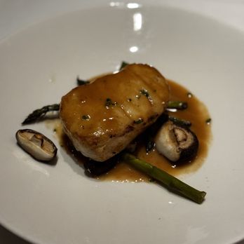 The Capital Grille - Pan-Seared Sea Bass with Shiitake Mushrooms, Asparagus and Miso Butter - Steakhouses Near Me - Oklahoma City, Oklahoma The Capital Grille - Pan-Seared Sea Bass with Shiitake Mushrooms, Asparagus and Miso Butter - Steakhouses Near Me - Oklahoma City, Oklahoma
