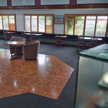 Riverside Restaurant & Function Centre - Tables and chairs under the windows, allowing for natural light - Restaurants Near Me - Inverell, NSW