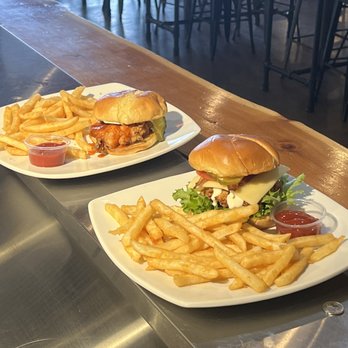 Timber - two plates of food on a table - Burgers Near Me - Pullman, Washington Timber - two plates of food on a table - Burgers Near Me - Pullman, Washington