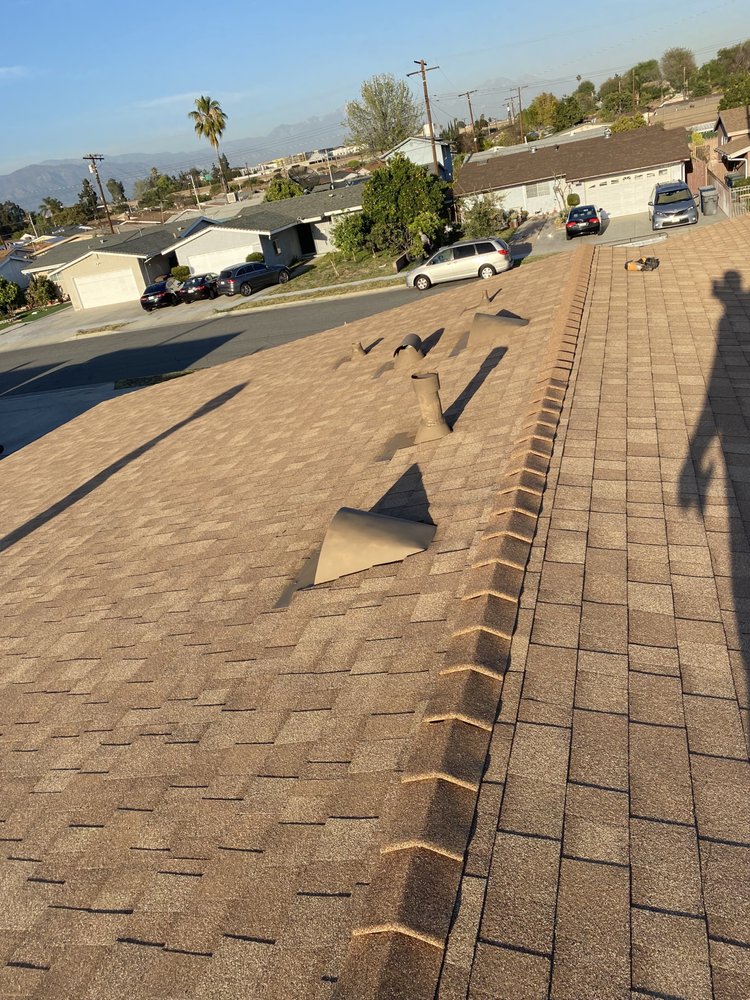 Slide of Green Ladder Roofing