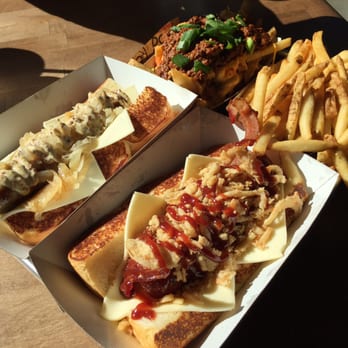 Dog Haus - Sandy - Top left clockwise: chili geese fries, regular fries, Cowboy dog, Das Brat - New American Near Me - Sandy, Utah Dog Haus - Sandy - Top left clockwise: chili geese fries, regular fries, Cowboy dog, Das Brat - New American Near Me - Sandy, Utah
