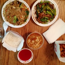 $28 haul. Clockwise: Vegetable Fried Rice, Beef-Broccoli, Egg Rolls, Orange Chicken, Hot & Sour Soup, Sweet & Sour Sauce, Steamed Rice.