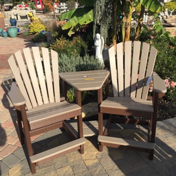 Visions Landscape Supply and Design - Counter height Adirondack settee. Weathered wood / chocolate. - Landscaping Near Me - Monroe, North Carolina Visions Landscape Supply and Design - Counter height Adirondack settee. Weathered wood / chocolate. - Landscaping Near Me - Monroe, North Carolina