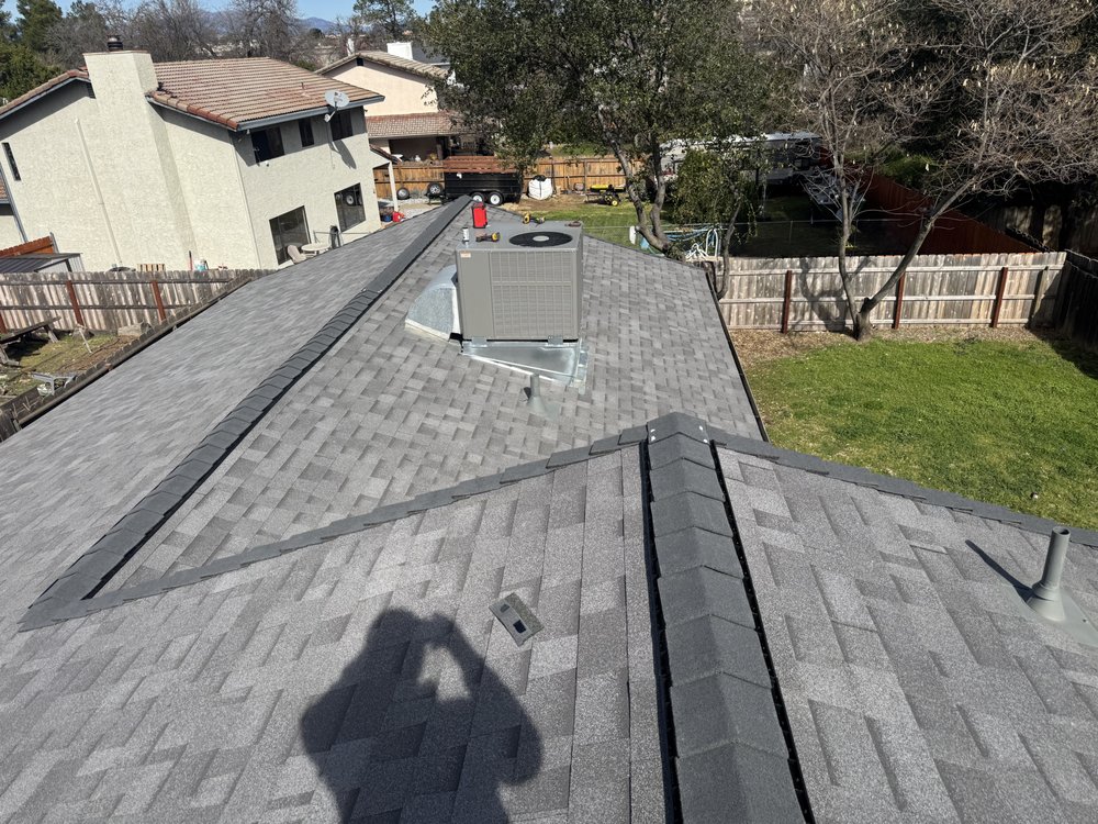 Slide of ZeZee Roofing