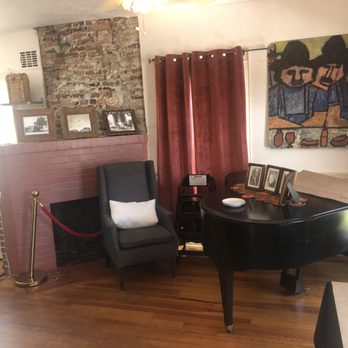 The Reserve Retreat - A nice piano in the dining room with photos of the Rigley family. - Coffee & Tea Near Me - Sarasota, Florida The Reserve Retreat - A nice piano in the dining room with photos of the Rigley family. - Coffee & Tea Near Me - Sarasota, Florida