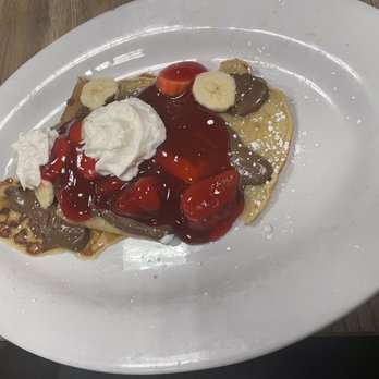 Chops & Eggs - Nutella crepe with banana and strawberries - New American Near Me - Corpus Christi, Texas Chops & Eggs - Nutella crepe with banana and strawberries - New American Near Me - Corpus Christi, Texas