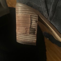 This is how my boot heel looked on their 2nd attempt to fix, and SADLY she actually thought that this was better!!!!