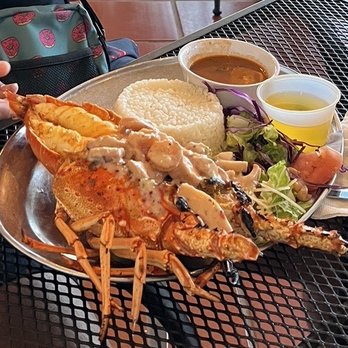 La Parrilla - Seafood stuffed lobster. Perfectly cooked - Latin American Near Me - Luquillo, Puerto Rico La Parrilla - Seafood stuffed lobster. Perfectly cooked - Latin American Near Me - Luquillo, Puerto Rico