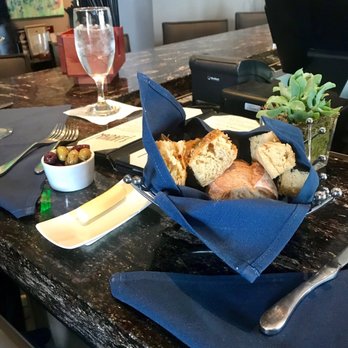 Masraff's - Bread basket and olives - New American Near Me - Houston, Texas