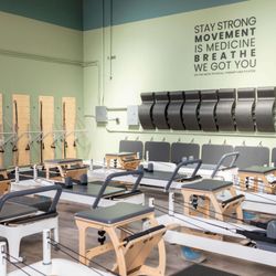 On the Move Physical Therapy and Pilates - Small Pilates studio in Belmont, CA. Reformers, pilates chairs, and springboard.