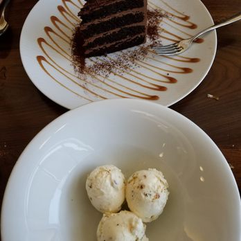 Nonna Restaurant - Pistachio-praline semifeddo and salted caramel chocolate cake. - Italian Near Me - Dallas, Texas Nonna Restaurant - Pistachio-praline semifeddo and salted caramel chocolate cake. - Italian Near Me - Dallas, Texas