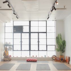 Yoga Corner - Beautiful natural light and yoga mats and props provided.
