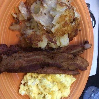 The Clique Restaurant - 2 eggs with home fries. (Pancakes not pictured) - New American Near Me - Detroit, Michigan The Clique Restaurant - 2 eggs with home fries. (Pancakes not pictured) - New American Near Me - Detroit, Michigan