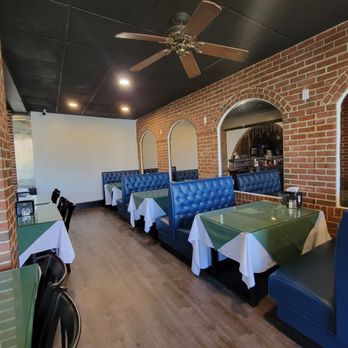 Indian Curry Lounge - a brick wall and a ceiling fan - Indian Near Me - Harrisburg, Pennsylvania