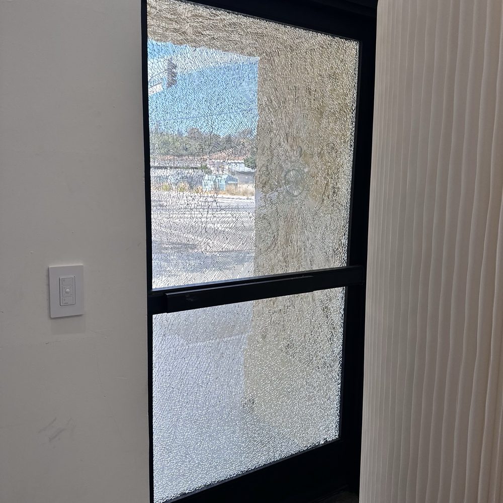 This is the door the homeless man smashed with a giant rock by repeatedly hitting it. This is the door the homeless man smashed with a giant rock by repeatedly hitting it.
