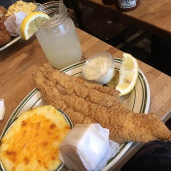 Peaches HotHouse - Regular catfish with creamy cheesy grits. - Southern Near Me - Brooklyn, New York