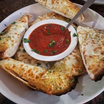 Paesanos Riverwalk - Italian Herb & Cheese Garlic Bread. This is a must! - Italian Near Me - San Antonio, Texas Paesanos Riverwalk - Italian Herb & Cheese Garlic Bread. This is a must! - Italian Near Me - San Antonio, Texas