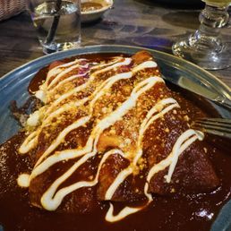 Chicken enchilladas rojos. They forgot the rice & beans, why? It was included on menu and really needed them to soak up the spiciness lol.