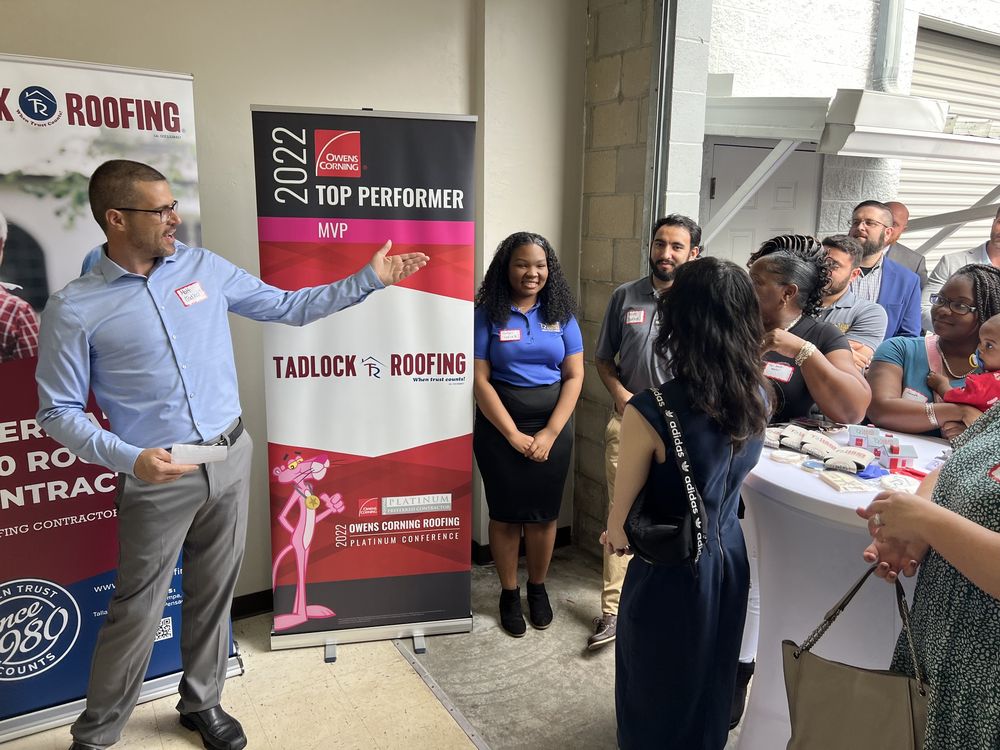 Slide of Tadlock Roofing