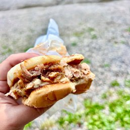 Delicious bbq sandwich with their homemade huckleberry bbq sauce, overnight smoked meat and homemade coleslaw. Delicious bbq sandwich with their homemade huckleberry bbq sauce, overnight smoked meat and homemade coleslaw.