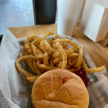 Baha Burger - a hamburger and onion rings in a basket - Burgers Near Me - Hoover, Alabama Baha Burger - a hamburger and onion rings in a basket - Burgers Near Me - Hoover, Alabama