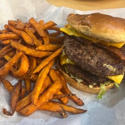 The Elvis burger with sweet potato fries. The Elvis burger with sweet potato fries.