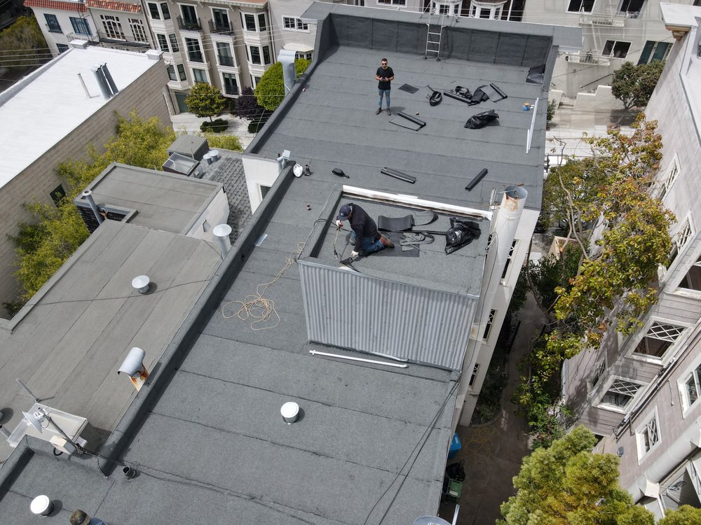 Slide of Apollo Roofing Company