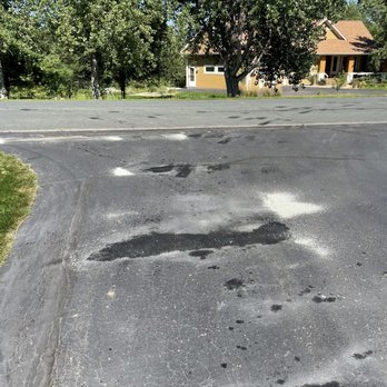 Prominent Construction - Driveway Damage From Hydraulic Fluid - Roofing Near Me - Minnetonka, Minnesota