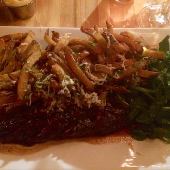 The Abbey - Grass-fed hanger steak frites with madeira sauce and a watercress salad. - New American Near Me - Cambridge, Massachusetts The Abbey - Grass-fed hanger steak frites with madeira sauce and a watercress salad. - New American Near Me - Cambridge, Massachusetts