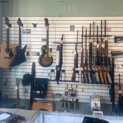 Destin Pawn - Destin Pawn - guitars and rifles