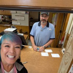 US Post Office - Alexander is helping me at the post office to hand stamp my postcards