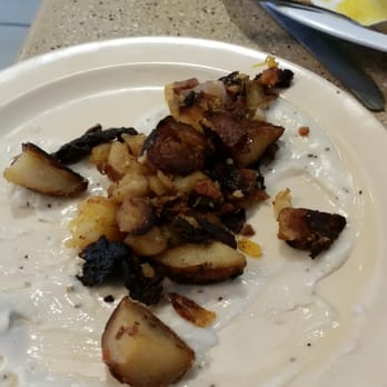 Chino Cafe - After a LONG wait, these were the under-sized & burned "Red Potatoes" they served, and the cap to the ketchup they FINALLY gave us to use. - Cafes Near Me - Chino, California