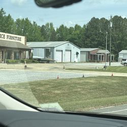 Carter Antiques - Church and a garage.  Bobs place in the back and it wasn't open.