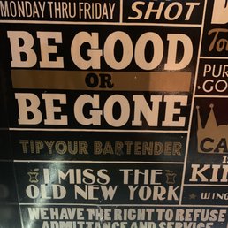 Entrance sign to bottom floor.