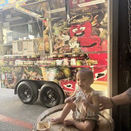 Our daughter loving the rice from Mayitas food truck!