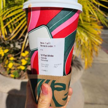 Starbucks - a hand holding a cup of coffee - Coffee & Tea Near Me - San Jose, California Starbucks - a hand holding a cup of coffee - Coffee & Tea Near Me - San Jose, California