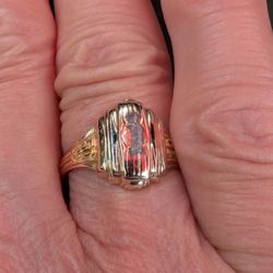 My Momma's class ring from 1950 after I scraped the crest off somehow. :(