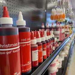 Over The Top Cake Supplies - Food gels, butter creams and fondants on the Color Wall