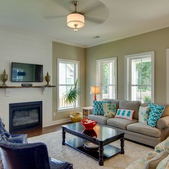 Lowcountry Creations - a living room with a fireplace - General Contractors Near Me Lowcountry Creations - a living room with a fireplace - General Contractors Near Me