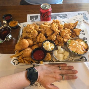Pelicana Chicken - Whatever Combo B with hand and can of Coke fot scale - Korean Near Me - Duluth, Georgia Pelicana Chicken - Whatever Combo B with hand and can of Coke fot scale - Korean Near Me - Duluth, Georgia