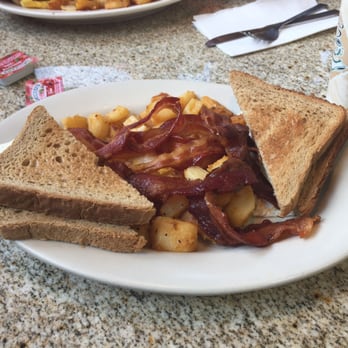 Sweet Touch Cafe - Poached eggs with bacon, home fries, and buttered toast - Coffee & Tea Near Me - Cambridge, Massachusetts Sweet Touch Cafe - Poached eggs with bacon, home fries, and buttered toast - Coffee & Tea Near Me - Cambridge, Massachusetts