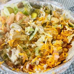 The Halal Guys - Chicken platter with white sauce, spicy sauce, and jalapeños. Yummy!!!!