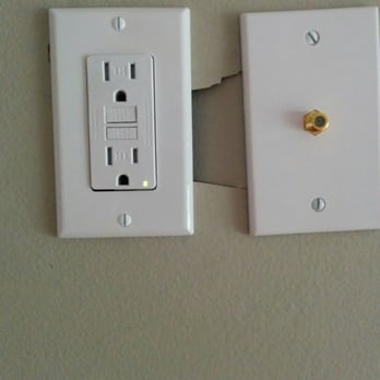 C & R Electric - The hole in the wall above my fireplace - it doesn't look great that the other box for the cable is not straight. - Electricians Near Me - Burien, Washington C & R Electric - The hole in the wall above my fireplace - it doesn't look great that the other box for the cable is not straight. - Electricians Near Me - Burien, Washington