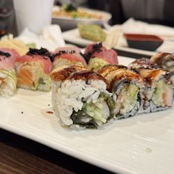 Hokkaido Sushi & Steak House - Dancing Eel Roll & H14. Tri-Color Roll in the back $16 each