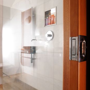 Ben The Builder - a bathroom with a toilet and sink - General Contractors Near Me - Ashland, Oregon Ben The Builder - a bathroom with a toilet and sink - General Contractors Near Me - Ashland, Oregon