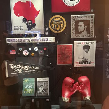 Obama Presidential Center - Display case with I think it's Muhammad Ali, Malcolm X Shirley Chisholm, and some other cool stuff - Museums Near Me - Chicago, Illinois Obama Presidential Center - Display case with I think it's Muhammad Ali, Malcolm X Shirley Chisholm, and some other cool stuff - Museums Near Me - Chicago, Illinois