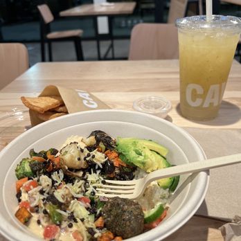 CAVA - Pineapple Apple mint, pita chips and a bowl!I got a bowl with grilled veggies and spicy falafel! Good as usual! - Mediterranean Near Me - Wake Forest, North Carolina